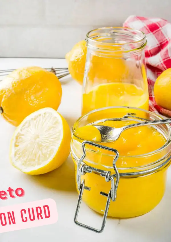 The result of this sugar free lemon curd recipe: A spoon in a jar of low carb, keto lemon curd.
