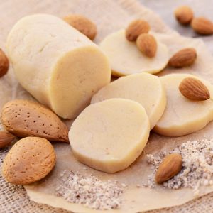 Sugar free Keto Marzipan sprinkled with whole almonds.