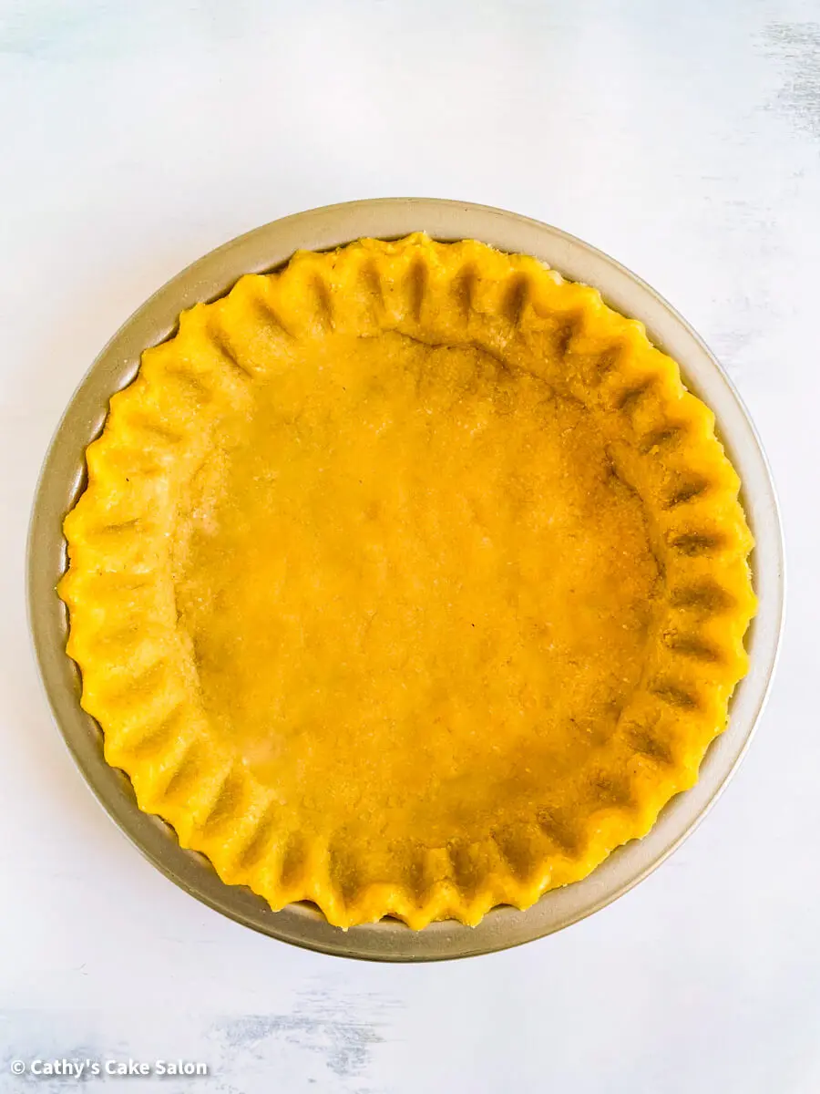 The fluted, unbaked eggless almond flour pie crust for this recipe. Sugar Free / Eggless / Gluten Free / Dairy Free | cathyscakesalon.com