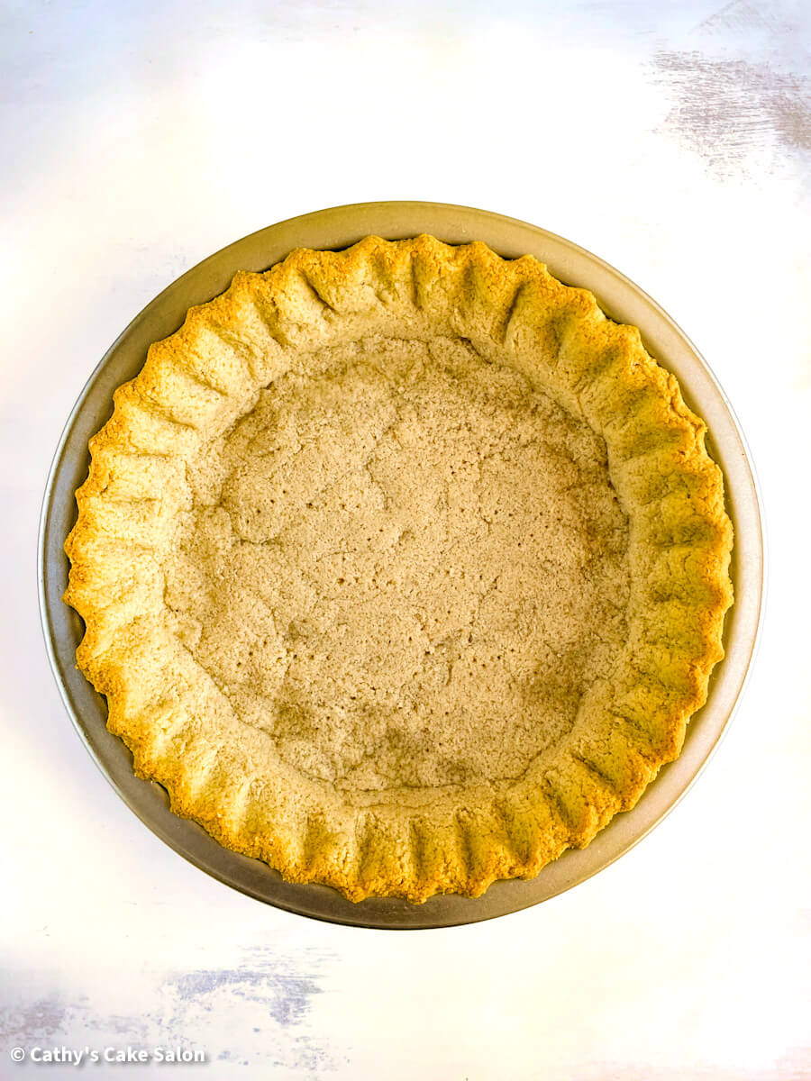 The baked vegan almond flour pie crust for this recipe. Sugar Free / Eggless / Vegan / Gluten Free / Dairy Free | cathyscakesalon.com